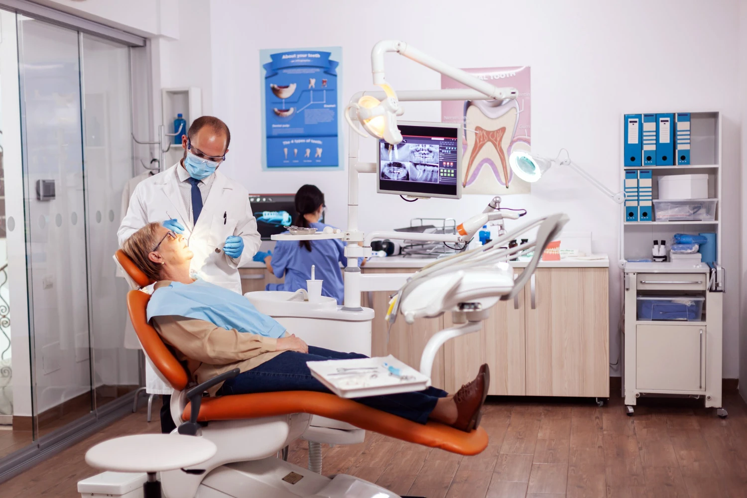 Brooklyn Smiles Dental Dentist with a patient